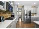 Modern kitchen with stainless steel appliances, sleek countertops, and an open design for easy living and cooking at 1165 Laurel Se Pl, Smyrna, GA 30080
