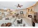 Open-concept living area connects a kitchen, a fireplace, and plenty of natural light at 1297 Hadaway Trl, Lawrenceville, GA 30043