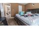 Bedroom with a ceiling fan, window, and a large bed at 3953 Dalhouise Ln, Decatur, GA 30034