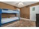 Bedroom featuring a bunk bed with carpeted flooring and a ceiling fan at 3953 Dalhouise Ln, Decatur, GA 30034