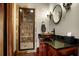 Stylish bathroom with marble walk-in shower and designer vanity at 833 Hines Rd, Moreland, GA 30259