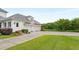 Attached three-car garage offers ample parking and storage space with easy access to home at 833 Hines Rd, Moreland, GA 30259