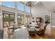 Elegant living room with large windows, french doors, and comfortable seating at 833 Hines Rd, Moreland, GA 30259