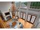 A view from above shows a living room with fireplace and chandelier at 833 Hines Rd, Moreland, GA 30259
