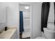 Well-lit bathroom with a vanity, toilet, and tub/shower combination at 3464 Navaho Se Trl, Smyrna, GA 30080