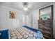 Bright bedroom with neutral walls, a modern ceiling fan, and access to storage space at 3464 Navaho Se Trl, Smyrna, GA 30080
