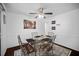 The dining room features decorative chairs, a glass table, and a stylish ceiling fan at 3464 Navaho Se Trl, Smyrna, GA 30080