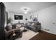 A spacious living room with plush sofas, modern decor, and a flat-screen TV at 3464 Navaho Se Trl, Smyrna, GA 30080