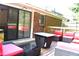 Inviting outdoor deck with comfortable seating and a modern fire pit feature at 3464 Navaho Se Trl, Smyrna, GA 30080