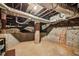 Unfinished basement space with exposed brick, providing a blank canvas for customization and additional storage at 685 Argonne Ne Ave # 15, Atlanta, GA 30308