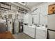 Functional basement laundry area equipped with modern washer and dryer units, offering convenience and efficiency at 685 Argonne Ne Ave # 15, Atlanta, GA 30308