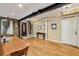 Open dining room with hardwood floors, exposed brick accents, and ample natural light at 685 Argonne Ne Ave # 15, Atlanta, GA 30308