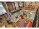 Top-down view of the exposed brick living room showcasing metal railings, hardwood floors, and open design at 685 Argonne Ne Ave # 15, Atlanta, GA 30308