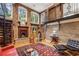 Spacious living room with exposed brick, a spiral staircase, and comfortable seating arrangements at 685 Argonne Ne Ave # 15, Atlanta, GA 30308