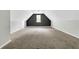Large attic with a window, offering potential for storage or conversion at 2005 Chicago Nw Ave, Atlanta, GA 30314