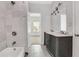 Spacious bathroom featuring a walk-in shower and a double sink vanity at 2005 Chicago Nw Ave, Atlanta, GA 30314