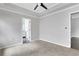 Bedroom with neutral colored carpet, natural light, and a ceiling fan at 2005 Chicago Nw Ave, Atlanta, GA 30314