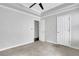 Bedroom with neutral walls, carpet, and white doors, and trim at 2005 Chicago Nw Ave, Atlanta, GA 30314