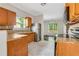 Functional kitchen with plenty of cabinet space, stainless steel refrigerator, and views to the Dining Area at 2005 Chicago Nw Ave, Atlanta, GA 30314