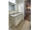 Bathroom vanity with granite countertops and white cabinets at 1833 Phillips Ave, East Point, GA 30344