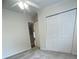 Bedroom with standard closet, ceiling fan, and a window at 1833 Phillips Ave, East Point, GA 30344