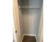 Walk-in closet with wood-look floors and wire shelving at 1833 Phillips Ave, East Point, GA 30344