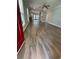 An open living room showcases sleek wood flooring and a modern, inviting atmosphere at 1833 Phillips Ave, East Point, GA 30344