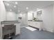 Bathroom with double vanity, ample lighting, and a tiled walk-in shower at 700 Park Regency Ne Pl # 1605, Atlanta, GA 30326