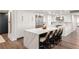 Modern kitchen with stainless steel appliances and quartz countertop island at 700 Park Regency Ne Pl # 1605, Atlanta, GA 30326