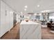 Bright kitchen featuring island with seating and open layout to the living spaces at 700 Park Regency Ne Pl # 1605, Atlanta, GA 30326