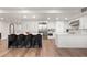 Spacious kitchen with stainless steel appliances, a center island, and hardwood floors at 700 Park Regency Ne Pl # 1605, Atlanta, GA 30326