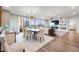 Bright and airy living room with hardwood floors, elegant decor, and a stunning city view at 700 Park Regency Ne Pl # 1605, Atlanta, GA 30326