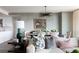 Comfortable living room with stylish decor and plenty of natural light at 700 Park Regency Ne Pl # 1605, Atlanta, GA 30326