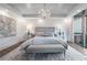 Charming main bedroom featuring hardwood floors, a chandelier, and a serene ambiance at 700 Park Regency Ne Pl # 1605, Atlanta, GA 30326
