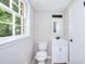 Bathroom features white vanity and fixtures at 2802 Leisure Woods Ln, Decatur, GA 30034