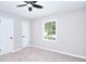 Bedroom boasts soft carpet, neutral walls and ceiling fan at 2802 Leisure Woods Ln, Decatur, GA 30034