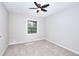 Bedroom featuring soft carpet, neutral walls and a window at 2802 Leisure Woods Ln, Decatur, GA 30034