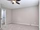 Bedroom with neutral walls and carpet, and an open door at 2802 Leisure Woods Ln, Decatur, GA 30034
