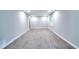 Open-concept living room with new floors, trim, and neutral paint at 2802 Leisure Woods Ln, Decatur, GA 30034