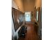 Inviting entryway with hardwood floors and tastefully decorated with a large painting and decorative mirror at 413 W Wind Dr, Villa Rica, GA 30180