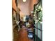 Welcoming entryway featuring hardwood floors and decor, leading into a cozy living space at 413 W Wind Dr, Villa Rica, GA 30180