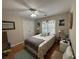 Cozy bedroom featuring a ceiling fan, natural light and hardwood floors at 881 Park Manor Nw Ct, Marietta, GA 30064