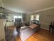 Comfortable living room with fireplace, custom built-ins, and hardwood flooring throughout at 881 Park Manor Nw Ct, Marietta, GA 30064