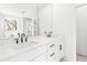 Contemporary bathroom showcasing double vanity, quartz countertops, and modern mirrors at 490 Hammons Way, Atlanta, GA 30315