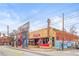 Pizza restaurant featuring retro signage and colorful graffiti at 490 Hammons Way, Atlanta, GA 30315