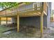 The backyard has a deck and a painted block foundation at 85 Ollie St, Atlanta, GA 30314