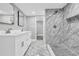 Bathroom features a double vanity, walk-in shower with tile surround, and two mirrors at 85 Ollie St, Atlanta, GA 30314