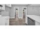 View from kitchen, showcasing the open layout to the living room, hardwood floors and more at 85 Ollie St, Atlanta, GA 30314