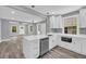 Updated kitchen with white cabinets, stainless steel appliances and an open layout at 85 Ollie St, Atlanta, GA 30314