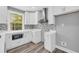 Bright and airy kitchen with white cabinets, subway tile backsplash, and modern appliances at 85 Ollie St, Atlanta, GA 30314